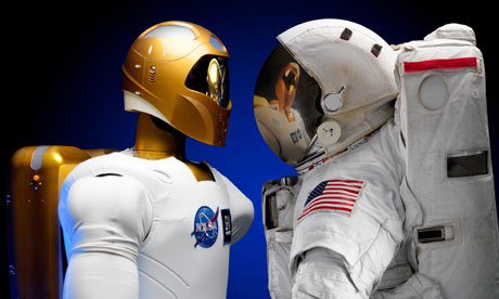 Robonaut-facing-off-with-astronaut