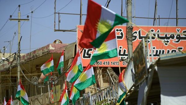 Агитационные плакаты, призывающие прийти на участки и проголосовать на референдуме о независимости Иракского Курдистана от Багдада, в Эрбиле. Архивное