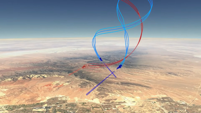 Два F-16 под управлением ИИ (синие) совместно ведут ближний воздушный бой с самолетом противника (красный) в симуляции