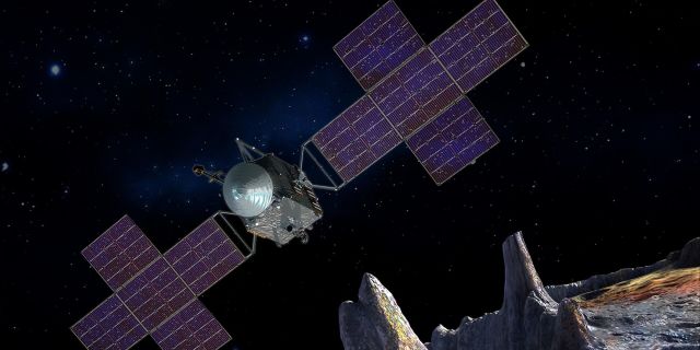 Космический корабль НАСА изучает астероид Психея в представлении художника