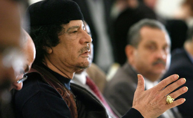 Лидер Социалистической Народной Ливийской Арабской Джамахирии Муамар Каддафи