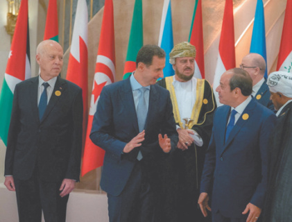 Майское заседание Лиги арабских государств запомнилось присутствием на нем сирийского президента Башара Асада (в центре) и его неформальной беседой с египетским президентом Абделем Фаттахом Сиси (крайний справа). Фото Reuters