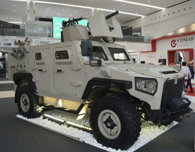 Новая бронированная машина Ajban Nimr 447A MRAV эмиратской компании Nimr Automotive в экспозиции международной оборонно-промышленной выставки IDEX-2019 в Абу-Даби (ОАЭ), февраль 2019 года