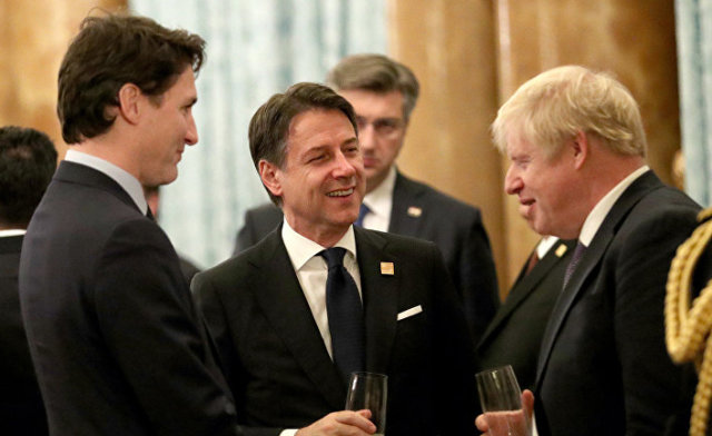 Премьер-министр Великобритании Борис Джонсон, премьер-министром Канады Джастин Трюдо и премьер-министр Италии Джузеппе Конте в Букингемском дворце в Лондоне