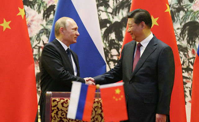 Президент РФ Владимир Путин и председатель КНР Си Цзиньпин на встрече в рамках саммита АТЭС
