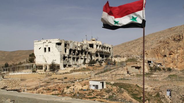 Разрушенное здание в Сирии