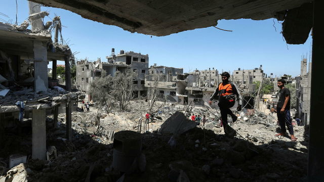 Разрушенные в результате израильских авиационных и артиллерийских ударов дома в северной части сектора Газа