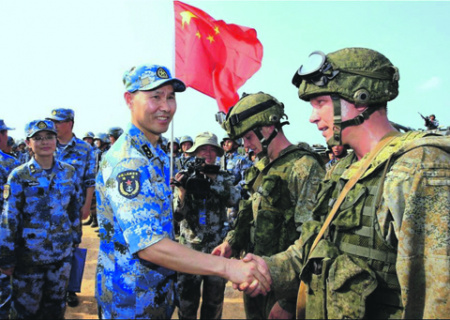 Схожесть взглядов на проблемы международной безопасности стала одной из причин активизации военного сотрудничества России и Китая. Фото с сайта www.news.cn
