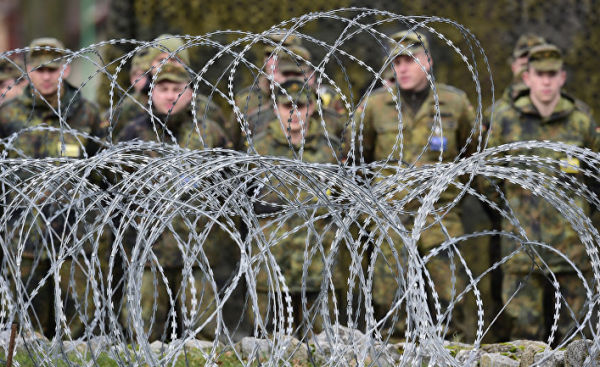 Солдаты на построении в многонациональном корпусе НАТО в Польше