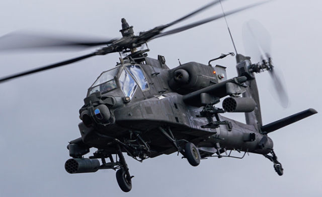 Вертолет AH-64 Apache на международных военных учениях "Summer Shield XIV" в Латвии