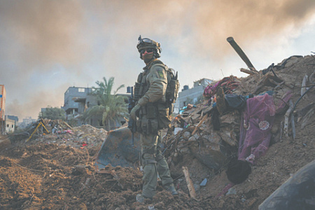 Военнослужащий ЦАХАЛ, участвующий в операции «Железные мечи». Фото Reuters
