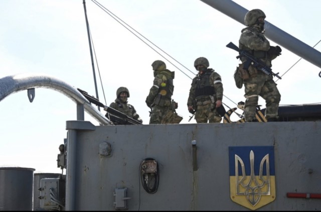 Захваченная российскими силами база катеров Государственной пограничной службы Украины в Бердянске, март 2022 года